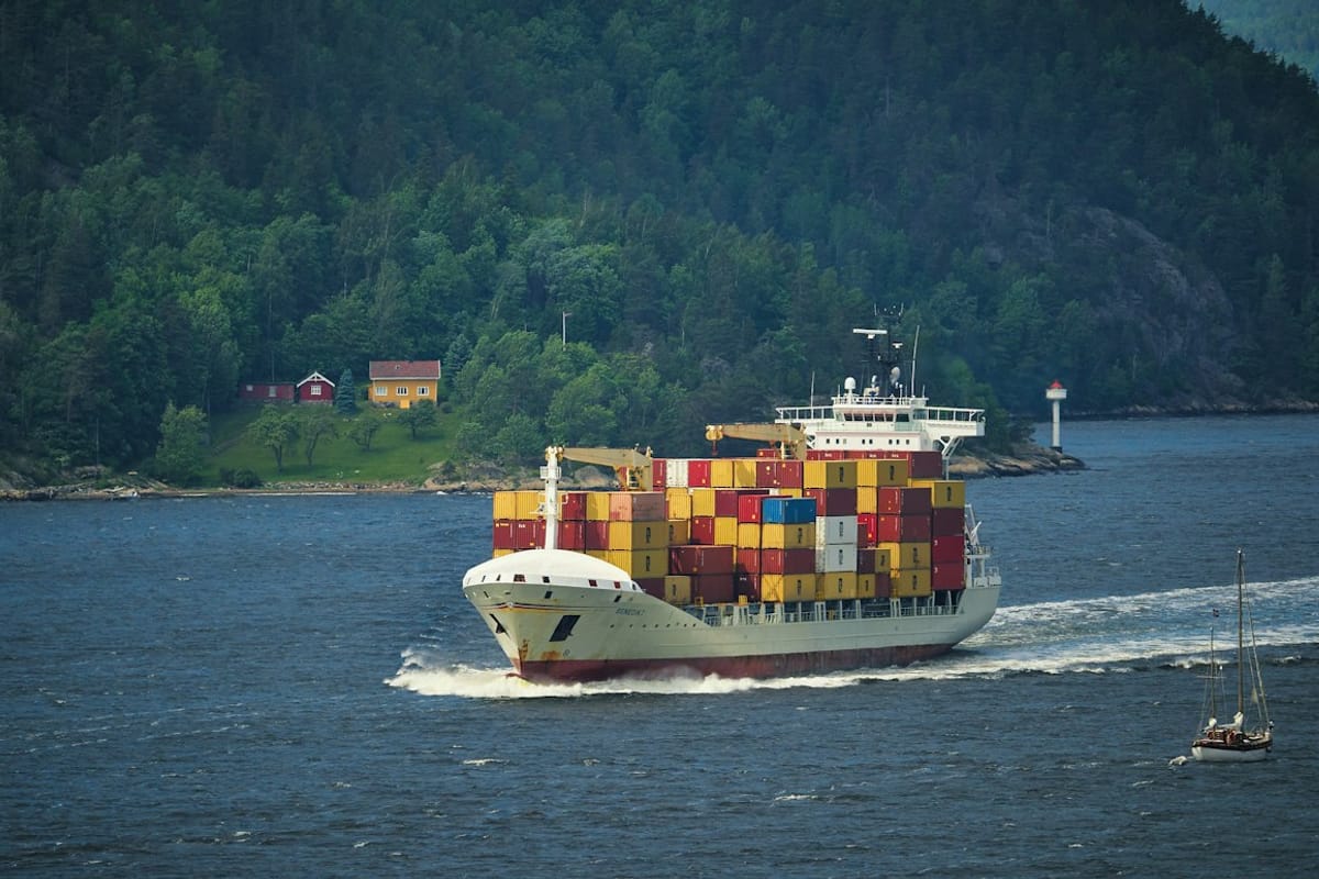 Cargo ship with containers at sea